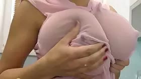 The slightest squeeze makes her boobs to produce milk